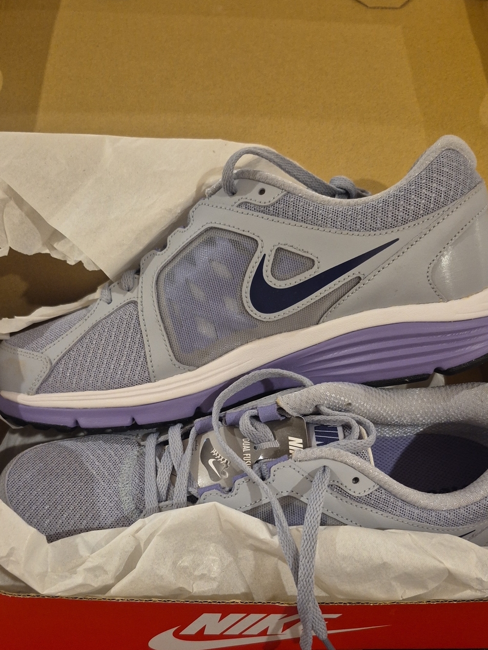 Nike Women’s Lavender Mesh Running Sneakers with Navy Swoosh